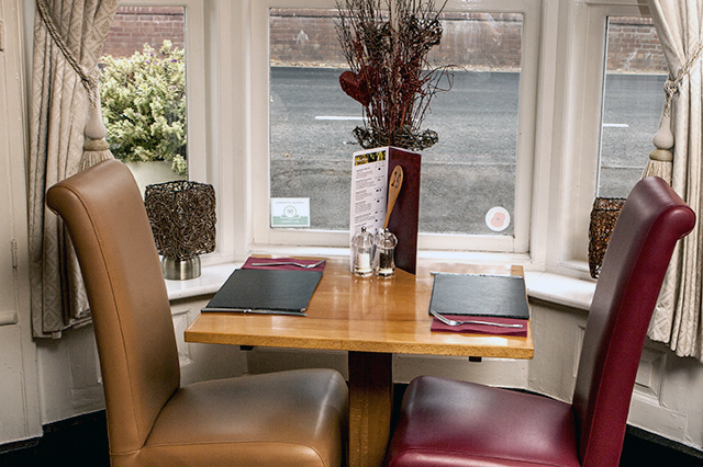 Image of seating in the restauraunt at the Percy Arms pub at Airmyn near Goole in EAsy=t Yorkshire.